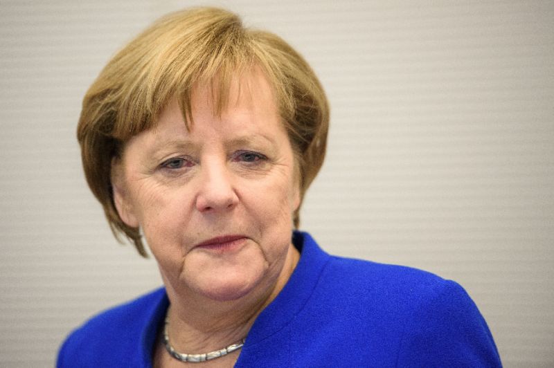 Merkel risks leading weak 'losers' coalition for Germany