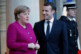 Merkel and Macron play up euro zone reform plans