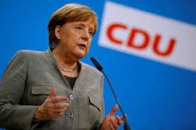Merkel readies for intense German coalition talks after tight SPD vote