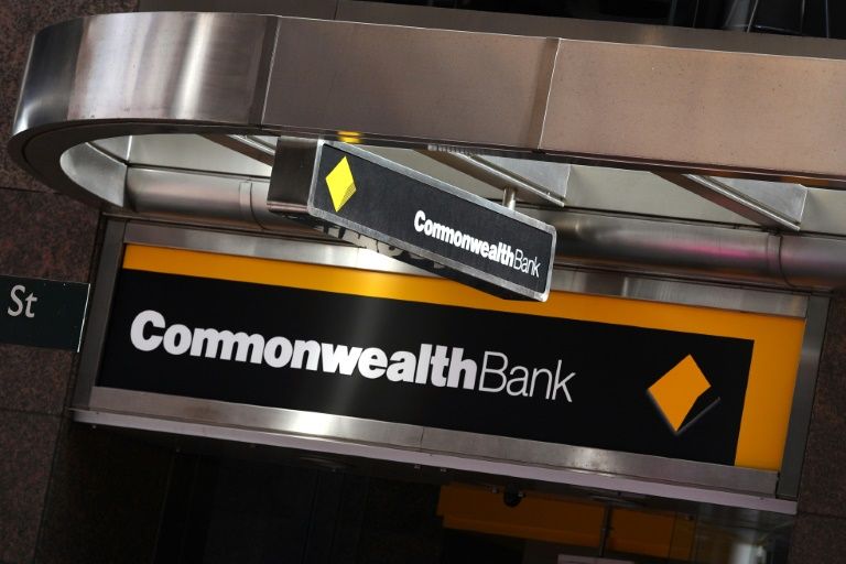Commonwealth Bank interim profit falls on scandal costs