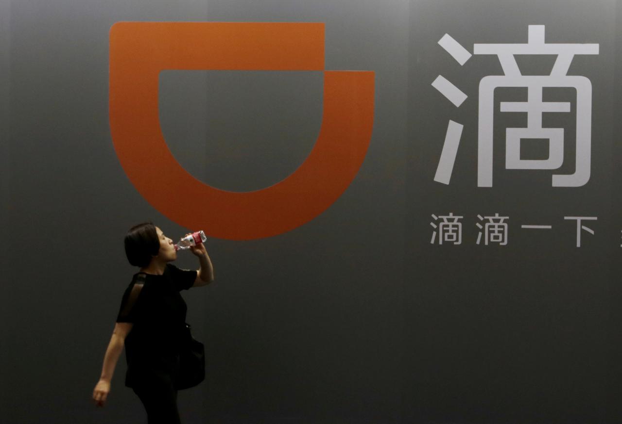 China's Didi, SoftBank to roll out taxi venture in Japan