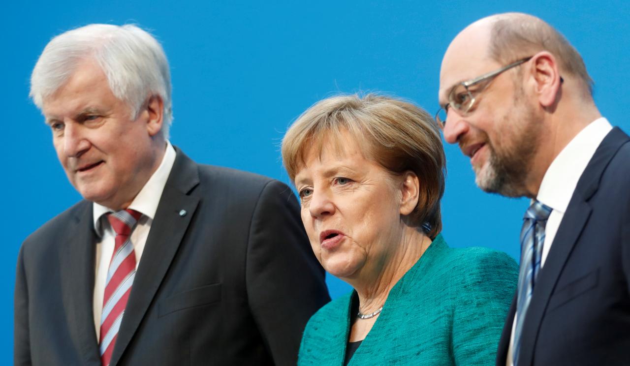 Critics in Merkel's conservatives vow to block coalition projects