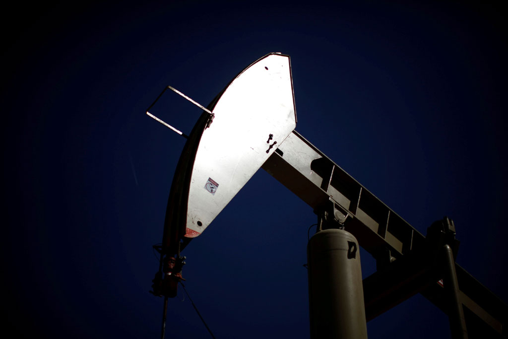 Oil prices fall more than 1 percent amid global market rout