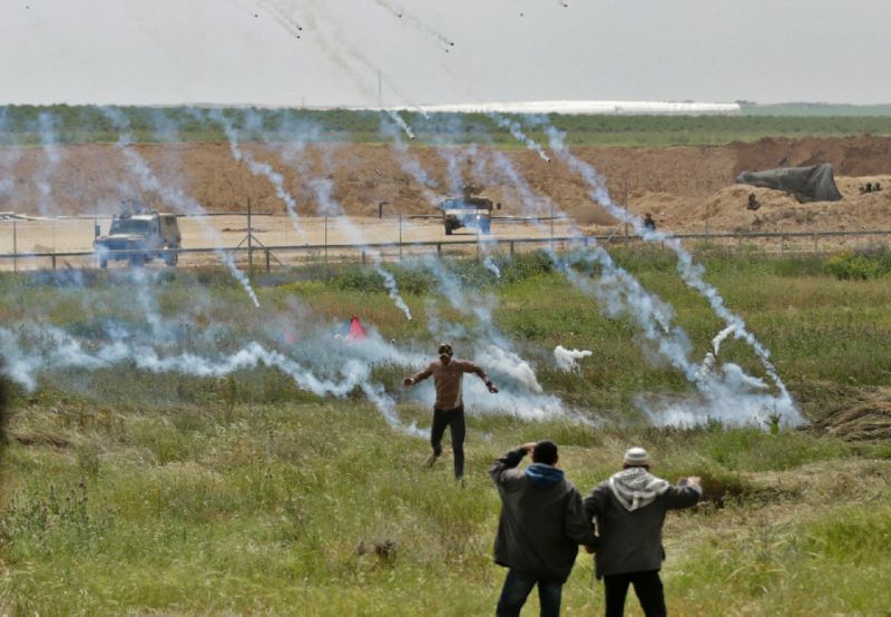 Israeli forces martyr 14 Palestinians on Gaza border