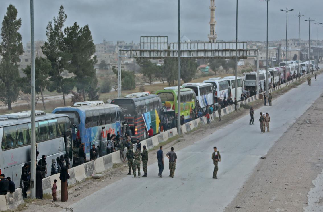 First rebels leave Syria enclave under Russian-brokered deal