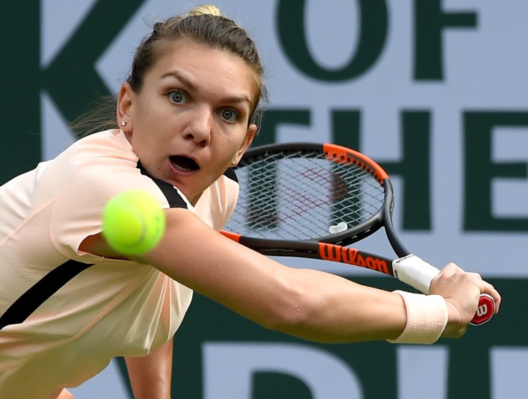 Halep prevails in three sets to advance to semi-finals
