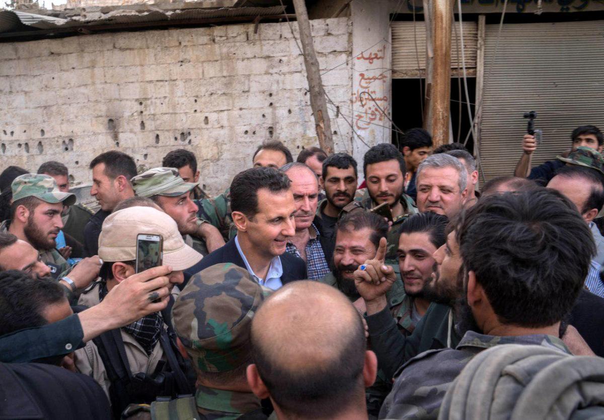 Syria's Assad visits army in eastern Ghouta as rebels in talks