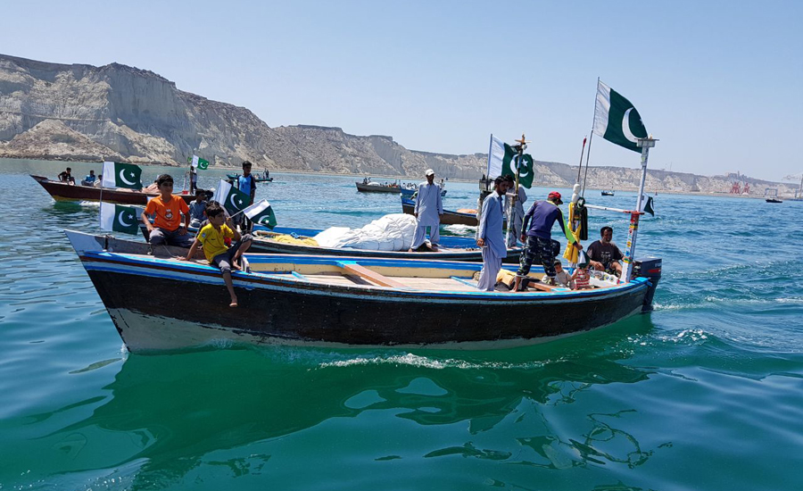 Pak Navy organizes fishermen’s boat rally in Gwadar