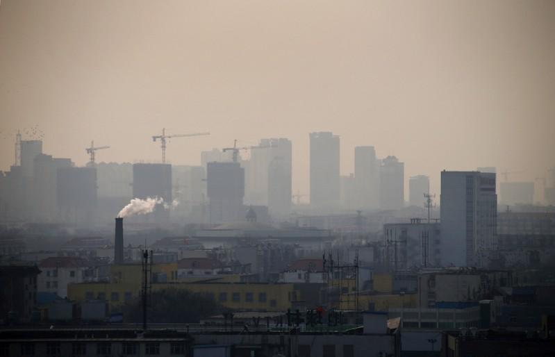 China urges northern cities to shut factories as smog builds