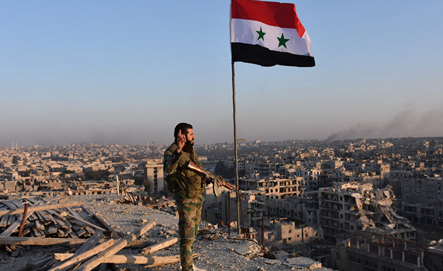 Syrian government raises flag in Douma