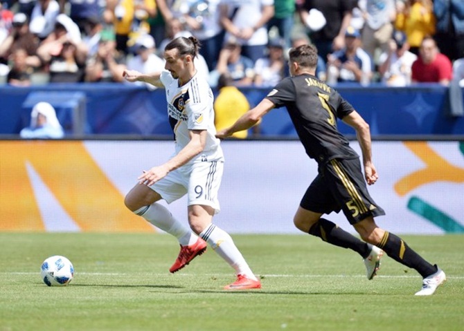 Footballer Zlatan shines on debut as Galaxy battle back to beat LAFC