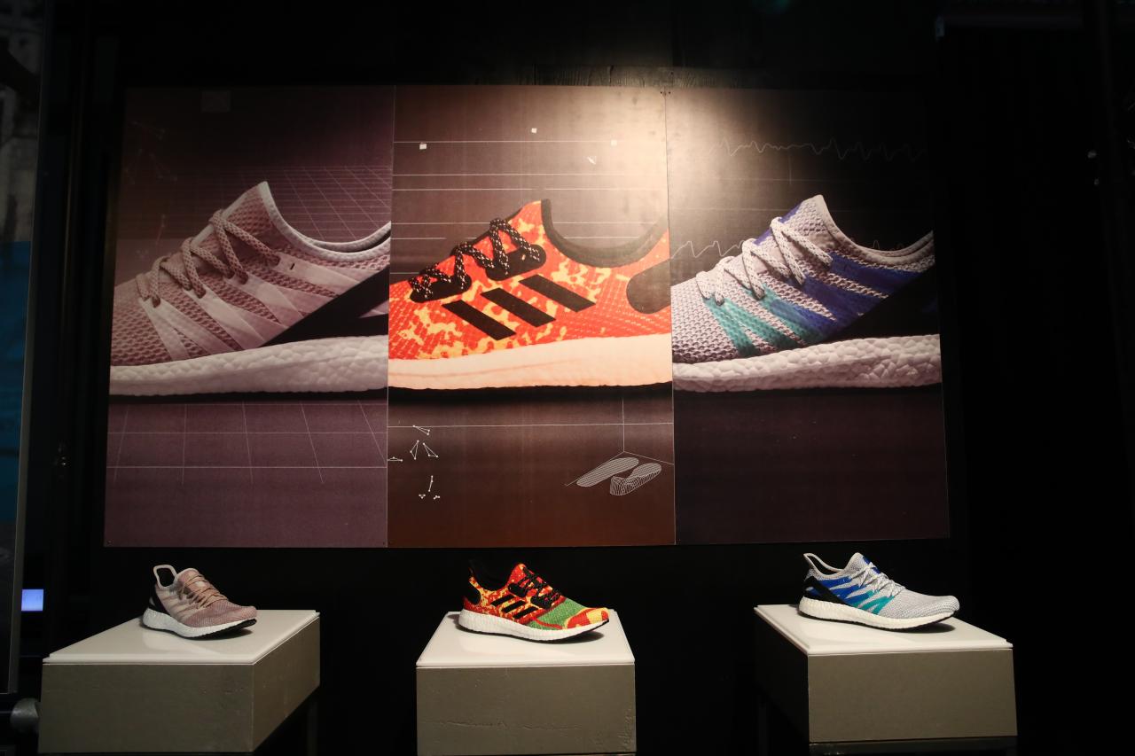 Adidas to close stores in online push