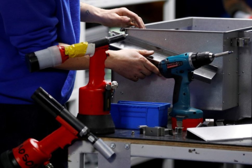 UK manufacturing growth cools to one-year low in first quarter