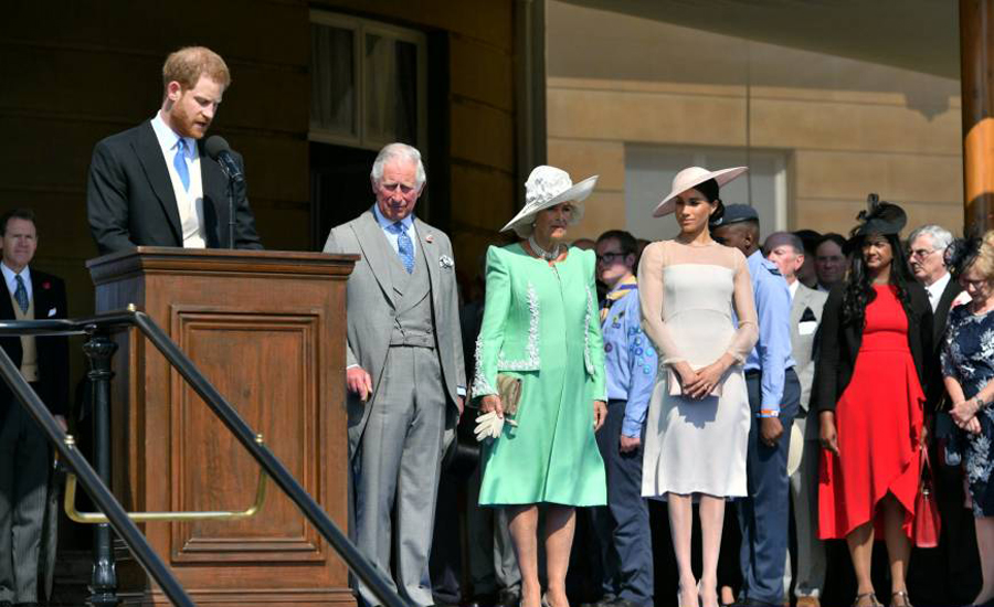 UK’s Prince Harry and Meghan Markle attend Charles' garden party