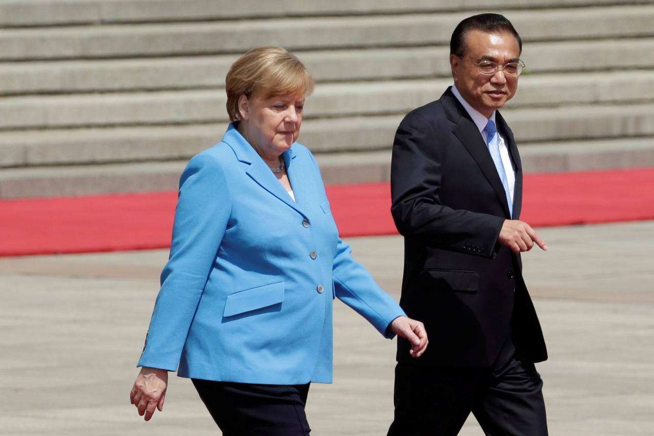 China's Li welcomes German investment as Merkel arrives in Beijing