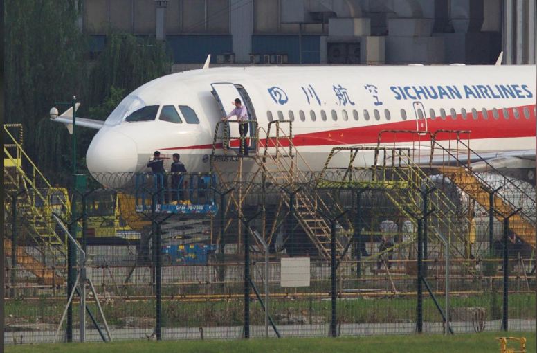 Sichuan Airlines pilot was "sucked halfway" out of window, captain says