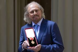 Bee Gees' Barry Gibb honored at Buckingham Palace with knighthood