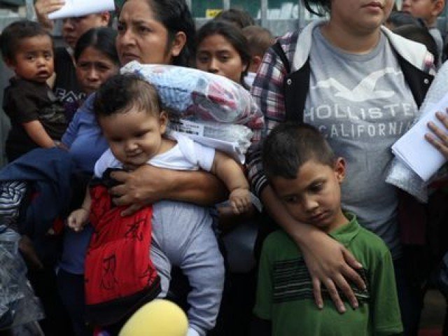 States sue Trump over immigrant families as Congress quarrels