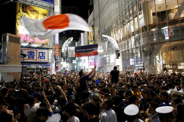 Japan fans celebrate as Samurai Blue reach last 16