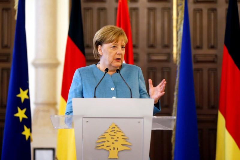 Merkel plays down chances of breakthrough in EU migration talks
