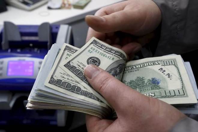 Dollar soars and Wall Street gains as ECB holds off on rate hikes