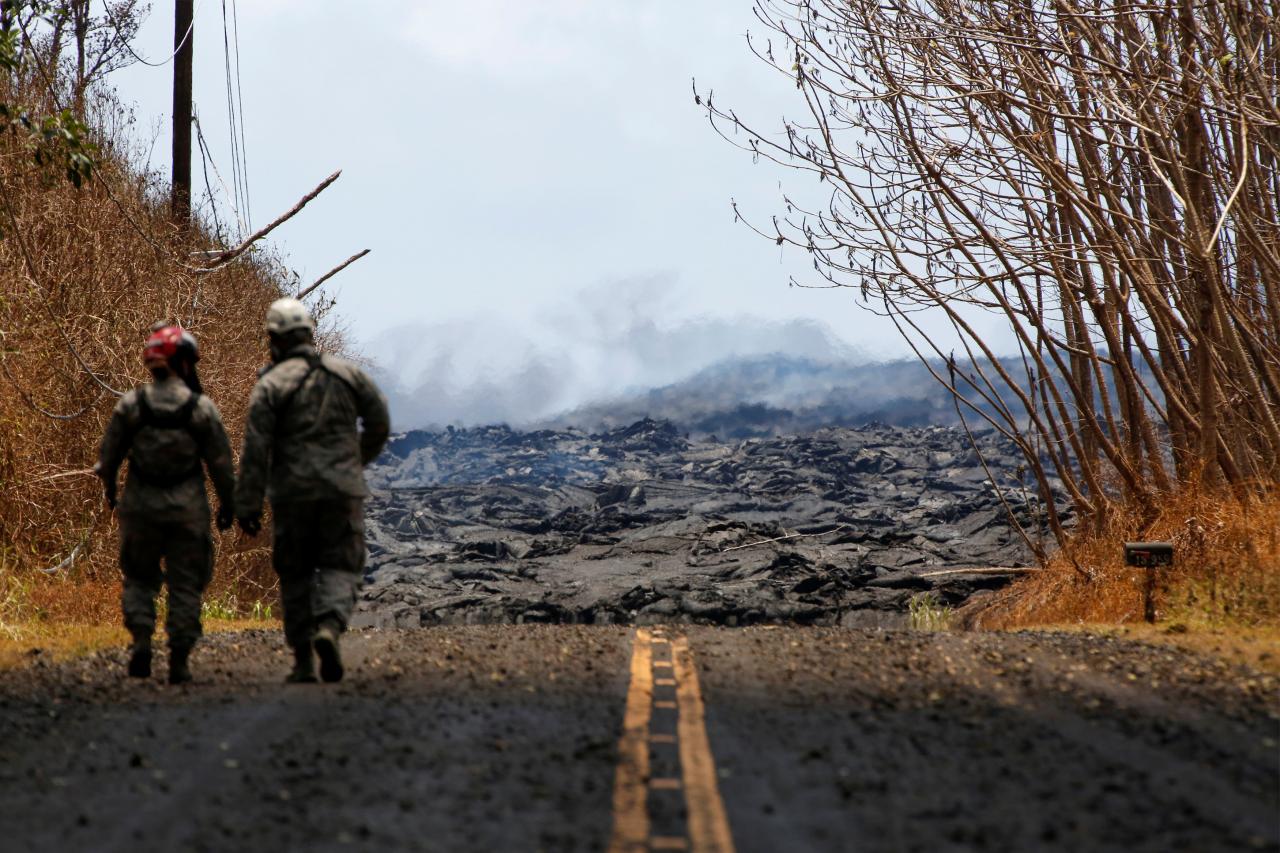 Three people trapped by lava airlifted to safety near Hawaii volcano