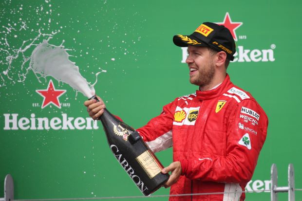 German racing driver Vettel takes 50th win and F1 championship lead in Canada