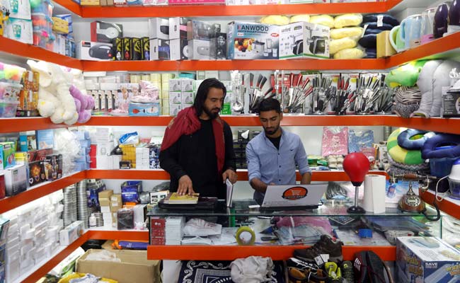 Afghan shoppers go online to avoid bombs, harassment