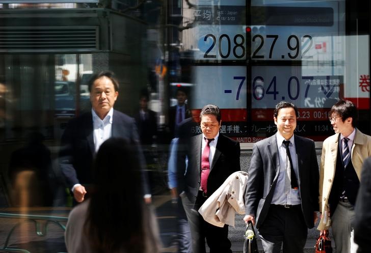 Stocks, commodities consolidate after latest trade war jolt