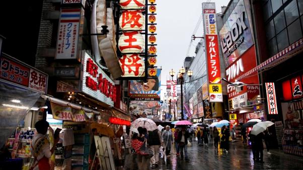 Japan seen hiking sales tax next year but trade spat or slump could delay