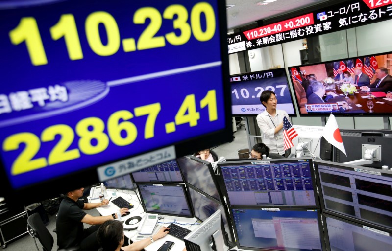 Asia stocks capped, dollar at two-week high as trade war dents confidence