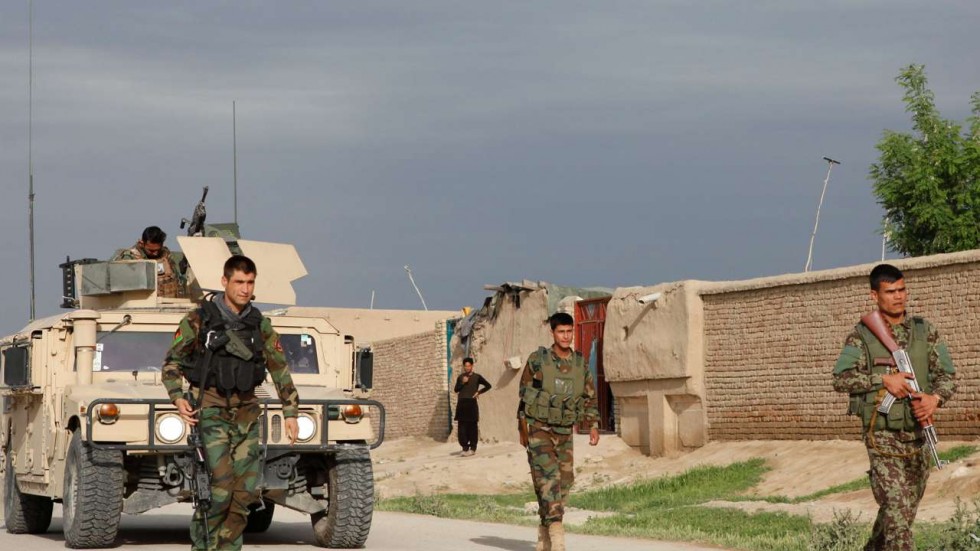 Taliban attack on Afghan military outpost kills dozens