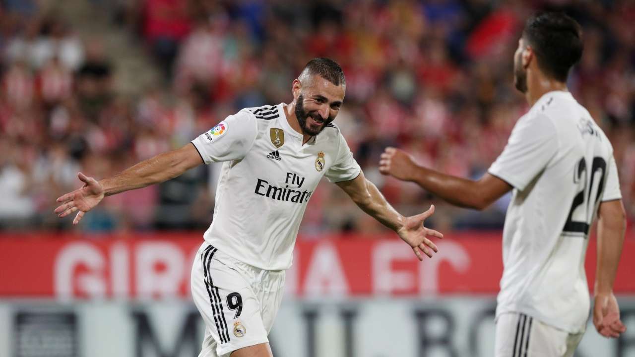 Real maintain perfect start with Benzema's double