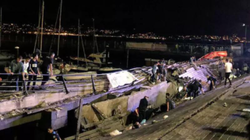 Hundreds hurt as Spanish festival boardwalk collapses into sea