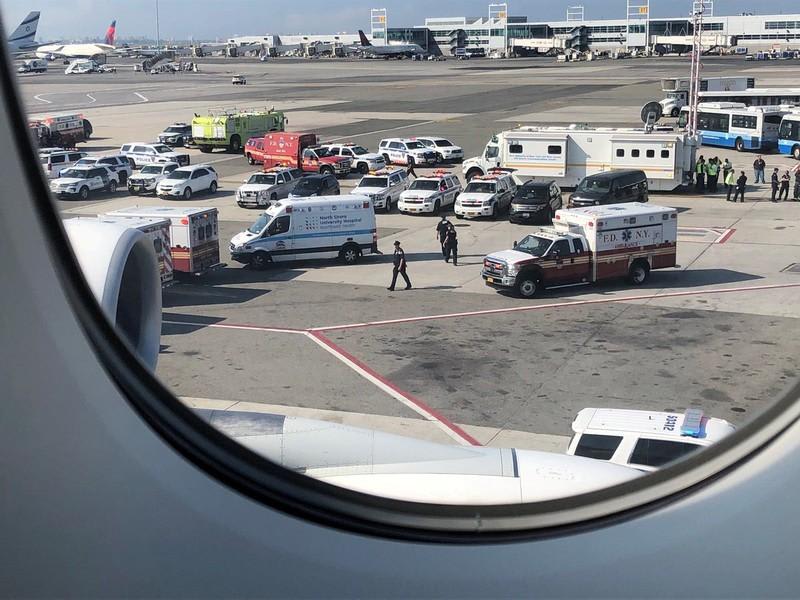 Eleven aboard flight from Dubai hospitalised in apparent flu outbreak