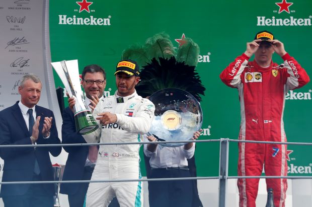 Hamilton wins as Vettel spins in Ferrari's backyard