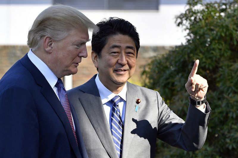 Japan PM Abe says arranging visit to China next month