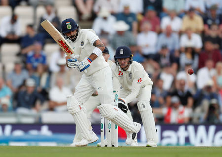 Curran takes key Kohli wicket as England fight back