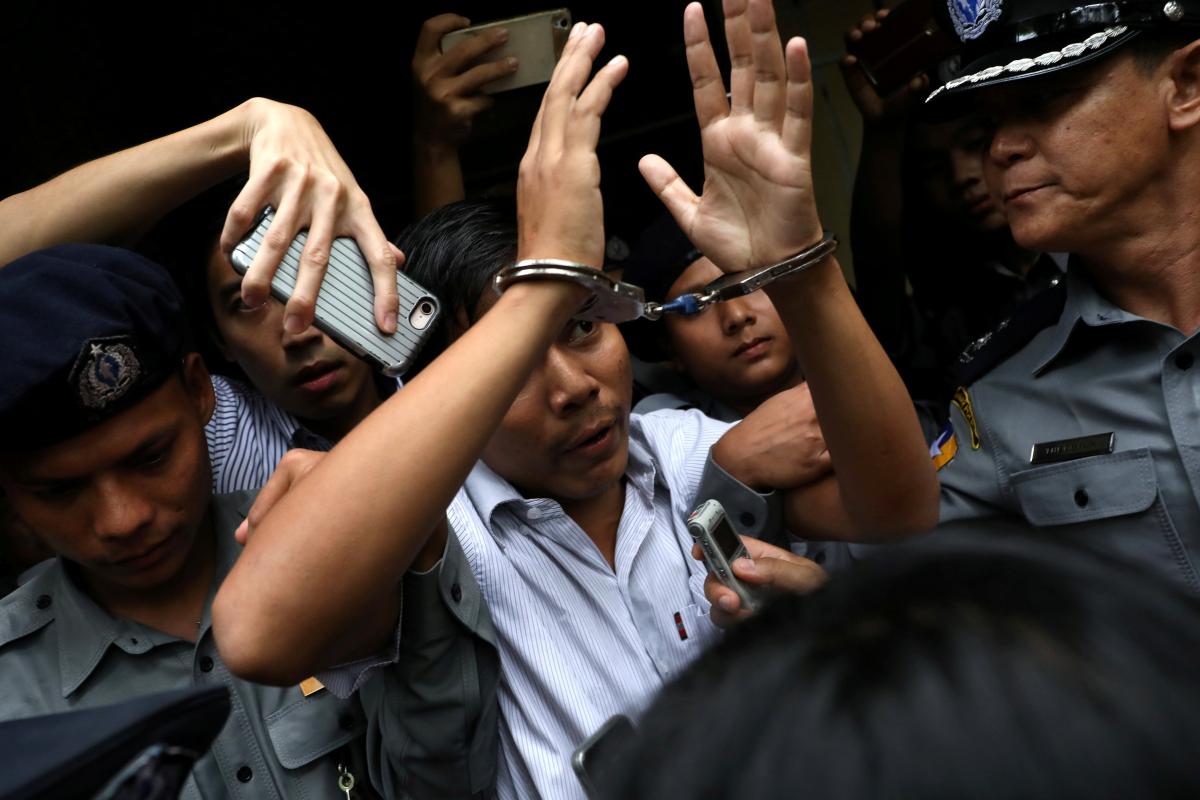 Myanmar court jails Reuters reporters for seven years in landmark secrets case