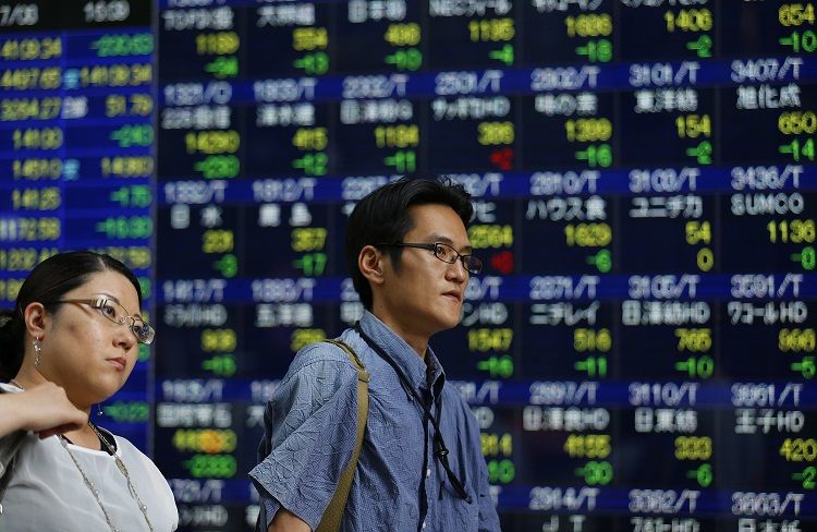 Asia shares can't shake trade stress, pound up on Brexit talk