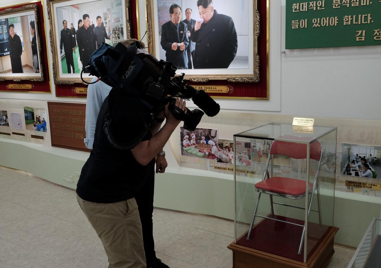 Chairs placed in glass, diagrams of footsteps: Kim Jong Un's visits memorialised in N.Korea