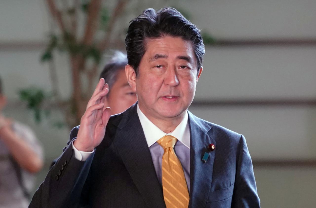 Japan's Abe likely to win party vote but faces Trump trade challenge
