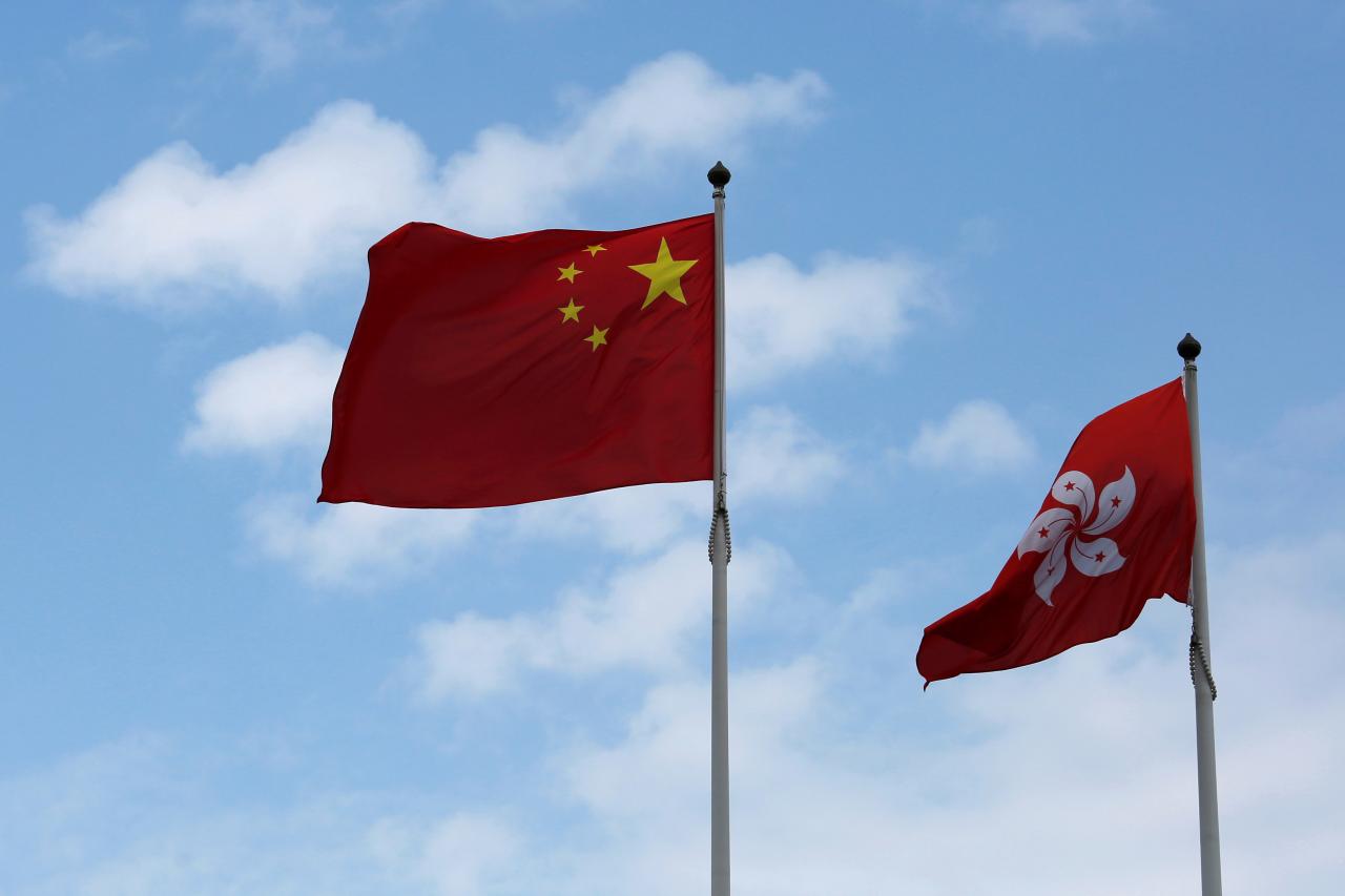 China state media says Hong Kong's 'one country, two systems' policy remains