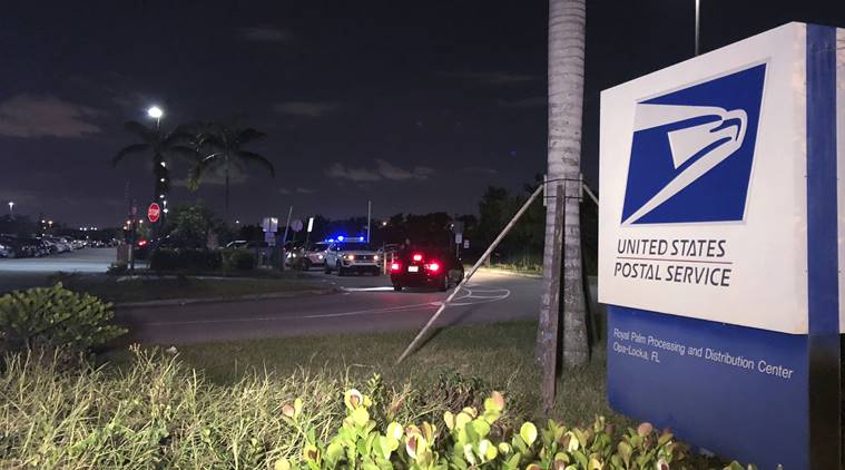 FBI searches Florida mail centre in hunt for sender of package bombs