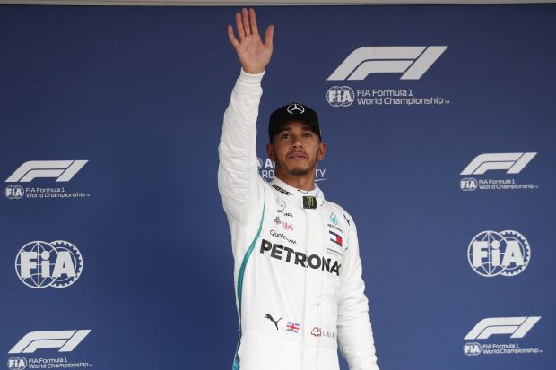 Hamilton storms to 80th pole in Japan, Vettel eighth