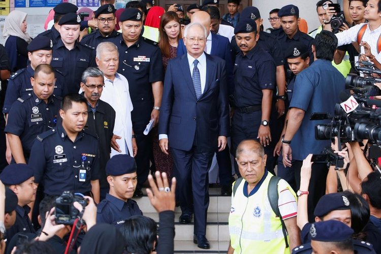 Former Malaysian PM Najib, ex-treasury chief charged with criminal breach of trust