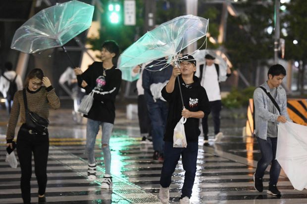 Powerful typhoon kills two, snarls transport for thousands in Japan
