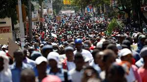 At least one dead, dozens hurt as thousands protest graft in Haiti