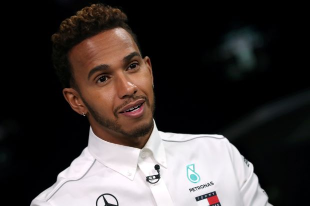 Hamilton's title hopes boosted by Vettel's grid drop