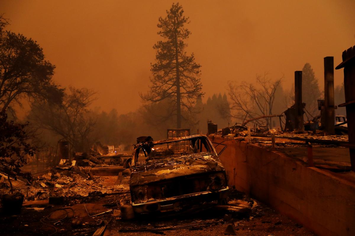 Malibu residents flee massive wildfire, five dead in Northern California